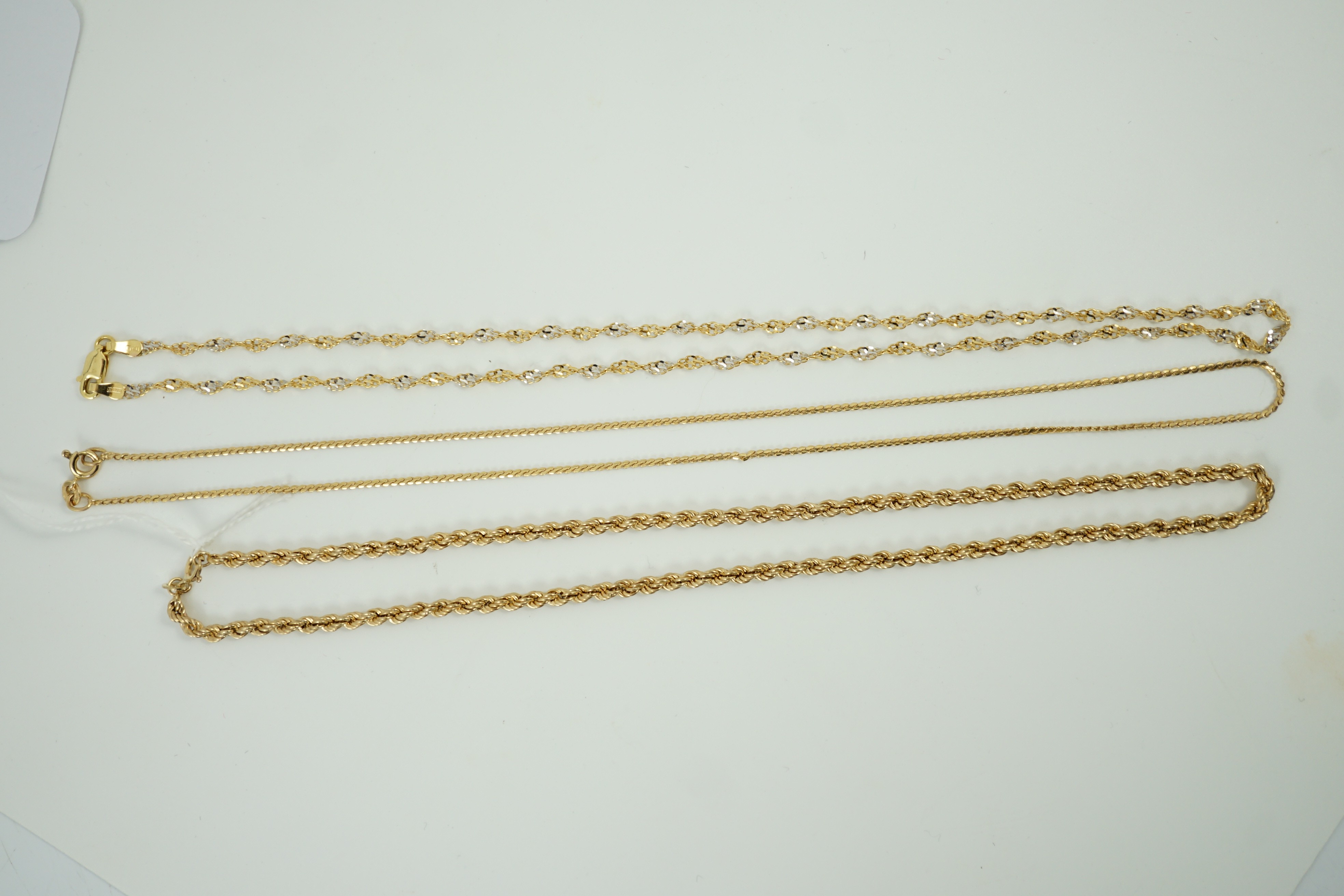 Four assorted modern 9ct gold chains, including rope twist, 39cm, 12.7 grams.